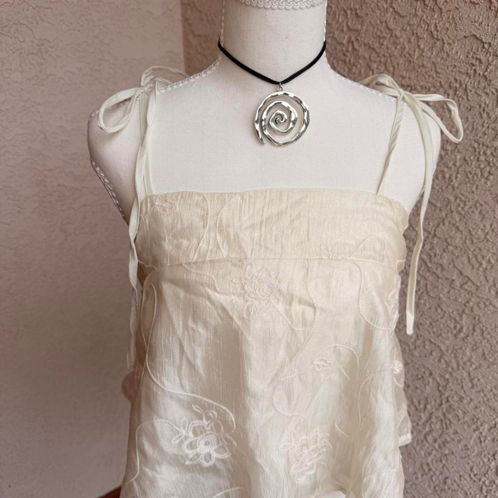 Cream lace top with tie up straps and floral embroidery